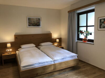 Gemütliche Schlafzimmer in der Ferienwohnung Top 4 im Appartement Schwab Ski-In & Ski-Out in Schladming Rohrmoos an der Piste der 4-Berge-Skischaukel